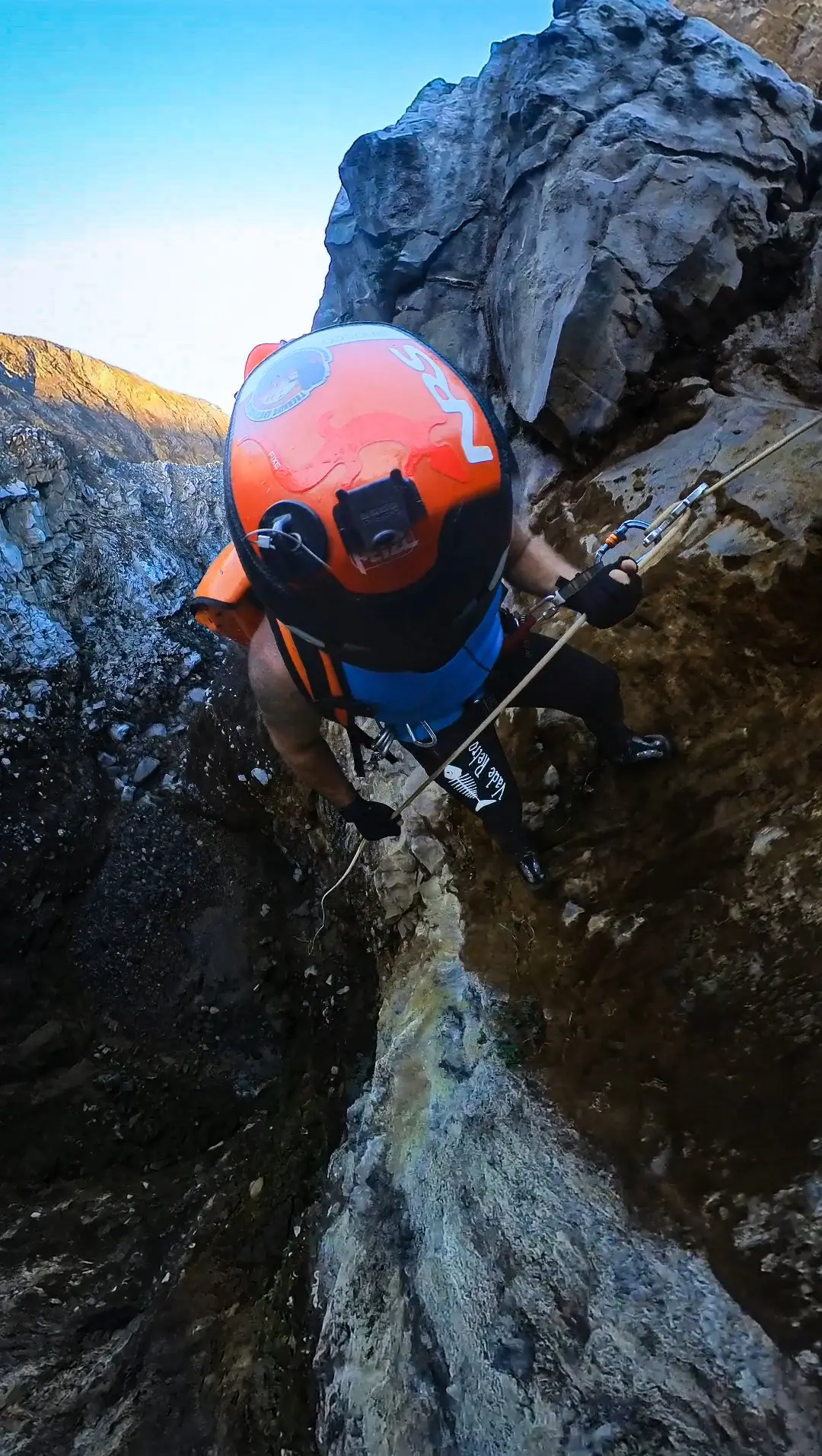 Canyoning helmet and harness before the first rappel