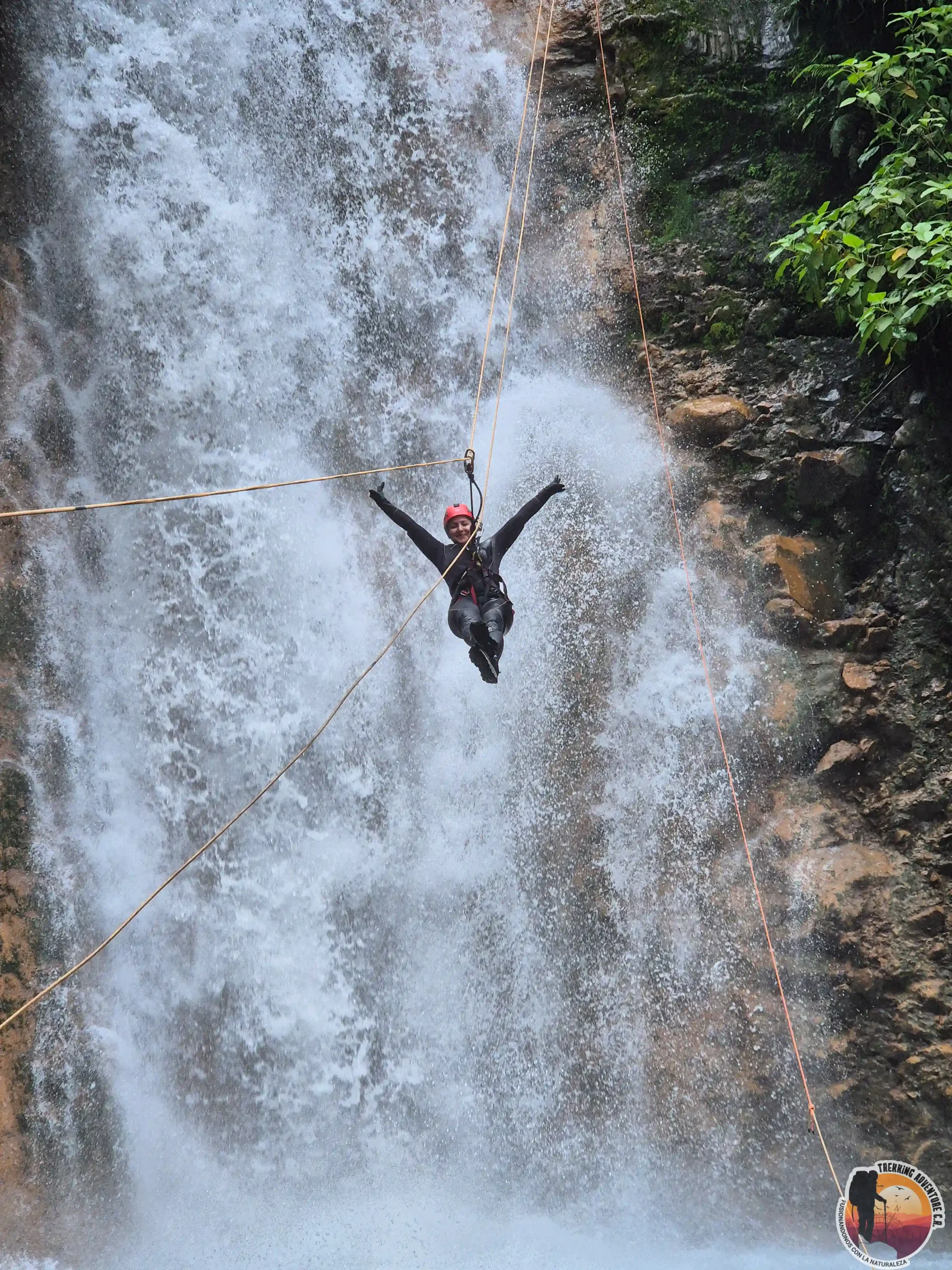 Canyoning waterfall rappel at Gata Media, Bajos del Toro