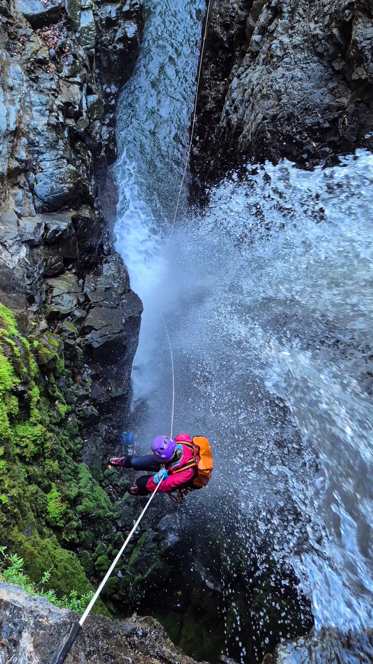 Bijagual Waterfall falling through dense rainforest in Costa Rica